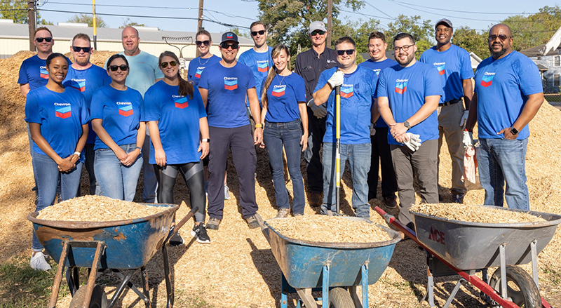 Group Photo with 3 wheelbarrows in front